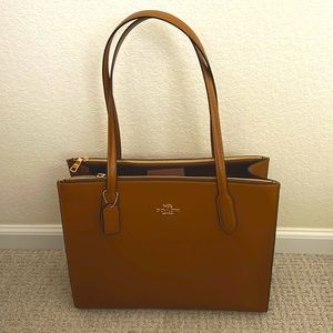 Coach Nina Carryall in Light Saddle